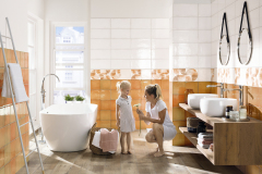 Séria Retro kombinuje efekt „vintage“ s geometrickým dekorom. Obklad sa vyrába vo formáte 20 × 40 cm, v tlmenej oranžovej a dvoch odtieňoch bielej farby (RAKO)